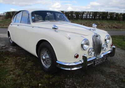 1964 Jaguar Mk2 2.4 Manual with Overdrive. White with Red Leather interior. SOLD