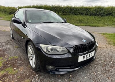 2011(June) BMW 325(3.0) Individual Coupe Automatic. Azurite Black Metallic with Individual leather interior. 60500 Miles. ULEZ EXEMPT. £360 Road Tax per annum. £7950.